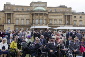 The audience of veterans enjoy the live music performed by Blake, British Vocal band photographed by London based photographer Jeff Gilbert
